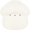 A white mushroom-shaped night light with simple facial features. Podgląd zdjęcia produktu