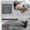 A dog bed is shown with a woman and her dog sleeping on a fluffy surface, and a dog lying on a tiled floor. Náhled obrázku produktu