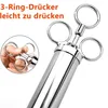 A close-up shot of a stainless steel marinade injector with text overlays. Produktbild-Vorschau