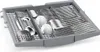 A dishwasher cutlery basket filled with silverware and a spatula. Anteprima dell’immagine prodotto