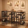 A bar table and stools set in a dining area with framed pictures on the wall. Podgląd zdjęcia produktu