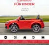 A red electric toy car for children, shown on a road with a green field in the background. The image includes text and icons highlighting product features. Produktbild-Vorschau