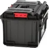 A black tool box with red latches and a clear lid is shown against a white background. Náhled obrázku produktu