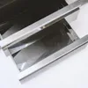 A close-up view of two stainless steel drawers, likely part of an outdoor kitchen or grill unit. Anteprima dell’immagine prodotto