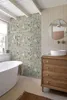 A bathroom with a bathtub and a vanity. Produktbild-Vorschau