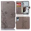 A collage of images showing a phone case for a Xiaomi 12T/12T Pro, with close-ups of its features and design. Produktbild-Vorschau
