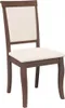 A single dining chair with a brown wooden frame and a cream upholstered seat and backrest, shown against a white background. Produktbild-Vorschau