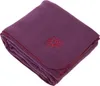 A folded purple fleece blanket with a red lotus flower embroidered on it, placed on a white background. Produktbild-Vorschau