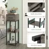 A narrow shelf unit with a drawer and two open shelves, decorated with a vase of flowers and figurines. The image is divided into sections highlighting product features. Produktbild-Vorschau