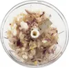 A close-up view of chopped onions and garlic in a food processor. Náhled obrázku produktu