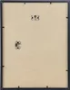The back of a black picture frame with mounting hardware. Produktbild-Vorschau