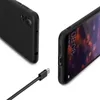 A black silicone phone case and a USB-C cable are shown against a white background. Produktbild-Vorschau