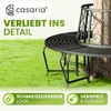 A black metal garden bench wraps around a tree trunk on a grassy lawn. Produktbild-Vorschau