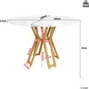 A diagram showing the dimensions of a round dining table with a marble-effect top and gold-colored legs. Voir les images du produit