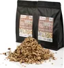 Two bags of whisky smoker chips and a pile of chips in front of them. Náhled obrázku produktu