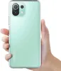A hand holding a transparent phone case. Produktbild-Vorschau