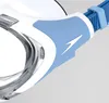 A close-up view of a white and blue swimming goggle. Voir les images du produit