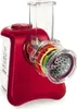 A red and white electric grater with multiple colored attachments is shown against a white background. Produktbild-Vorschau