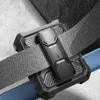 A close-up shot of a black phone case attached to a gray strap, possibly a belt or a bag strap. Produktbild-Vorschau