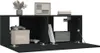 A black TV cabinet with two open compartments, displaying gaming controllers, a storage box, and a small speaker. Produktbild-Vorschau