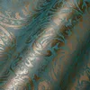 A close-up of textured wallpaper with a damask pattern. Produktbild-Vorschau