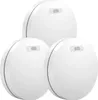 Three white smoke detectors are arranged in a cluster against a white background. Produktbild-Vorschau