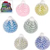 Presser la boule avec des perles d'eau, des confettis et du Voir les images du produit 5