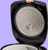 Close-up view of the inside of an open rice cooker lid. Produktbild-Vorschau