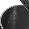 Close-up view of the inside of a metal kettle, showing embossed text indicating food grade material and maximum fill level. Produktbild-Vorschau