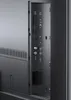 A close-up view of the ports and connections on the back of a television. Produktbild-Vorschau