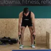 A man is performing an exercise with resistance bands in a gym. Náhled obrázku produktu