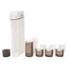 A white storage organizer with four drawers and a separate black cylindrical item, all on a white background. Náhled obrázku produktu