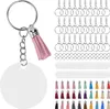 A collection of DIY keychain supplies, including blank acrylic circles, jump rings, tassels, and keychain chains, arranged on a white background. Produktbild-Vorschau