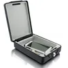 An open safe box with a smartphone and keys inside, shown on a white background. Podgląd zdjęcia produktu