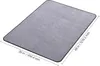 A gray chair mat with dimensions indicated by measurement lines and text. Produktbild-Vorschau