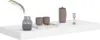 A white shelf with decorative items. Anteprima dell’immagine prodotto