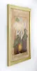A framed painting of calla lilies is shown against a white wall. Produktbild-Vorschau