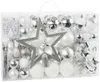 A clear, well-lit studio shot of a box filled with various Christmas ornaments in silver and white. Produktbild-Vorschau