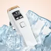 A white and gold hair removal device is shown surrounded by ice cubes, against a light peach background. Produktbild-Vorschau
