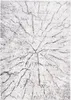 A close-up view of a rug with a distressed abstract pattern. Náhled obrázku produktu