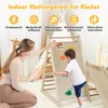 A woman and a child are playing with a wooden indoor climbing structure. Produktbild-Vorschau