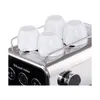 A close-up view of the top of a Russell Hobbs espresso machine, with four white cups resting on a warming rack. Produktbild-Vorschau