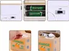 A collage showing different aspects of a coin-stealing cat money box, including its battery compartment, on/off switch, and how it operates. Náhľad obrázku produktu
