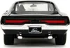 The rear view of a black 1970 Dodge Charger R/T model car. Náhľad obrázku produktu