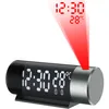 A digital alarm clock projecting the time and temperature onto a surface. Produktbild-Vorschau
