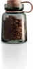A glass storage jar filled with almonds, with a wooden lid and a leather handle. Voir les images du produit
