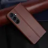A brown leather flip case for a smartphone is shown on a dark background. Produktbild-Vorschau