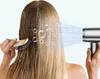 A person is drying their hair with a hairdryer while brushing it. Podgląd zdjęcia produktu