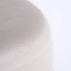 A close-up view of the textured surface of a beige ottoman. Podgląd zdjęcia produktu