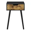 A single black and wood-grain bedside table with black metal legs, shown against a white background. Náhled obrázku produktu